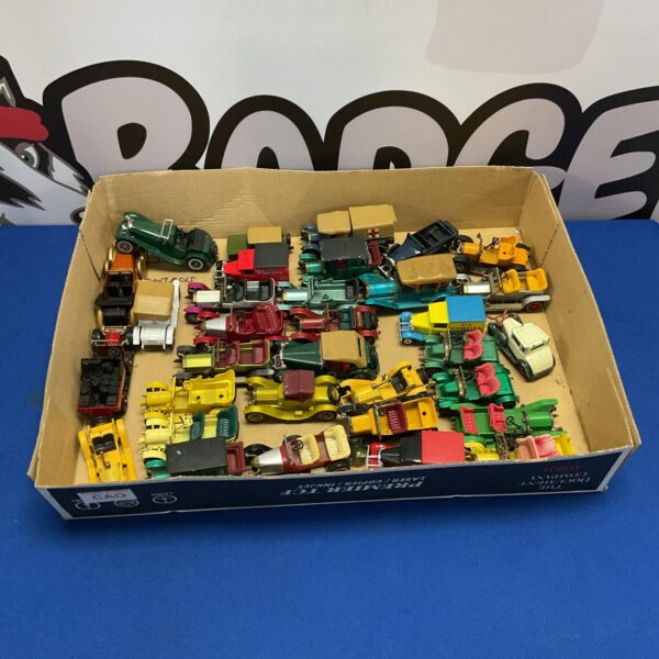 Vintage diecast model car collection, including Matchbox and Days Gone styles.