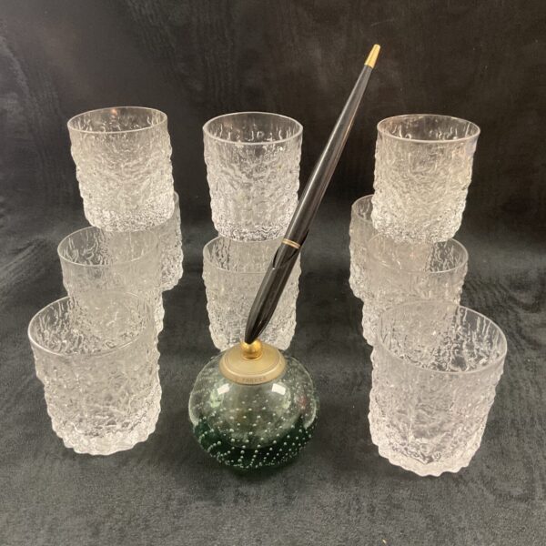 Eleven Whitefriars textured whiskey tumblers with a Parker pen holder.