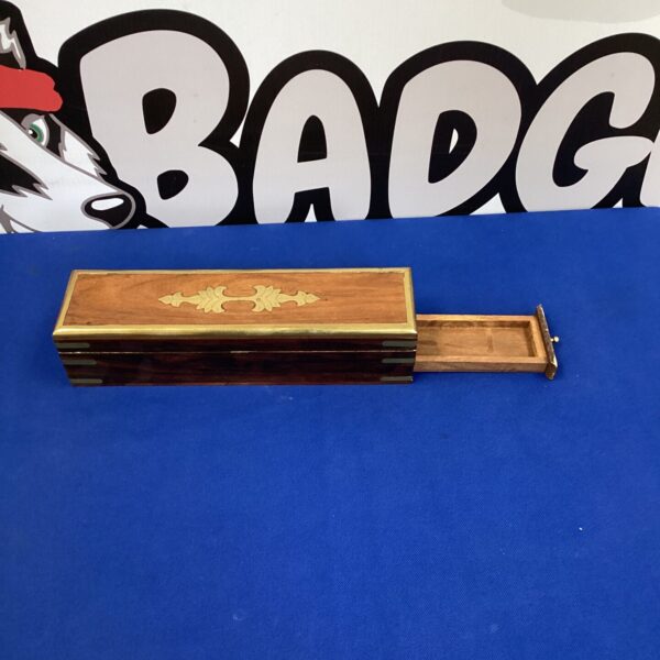 Antique Victorian fountain pen box with inlaid design.
