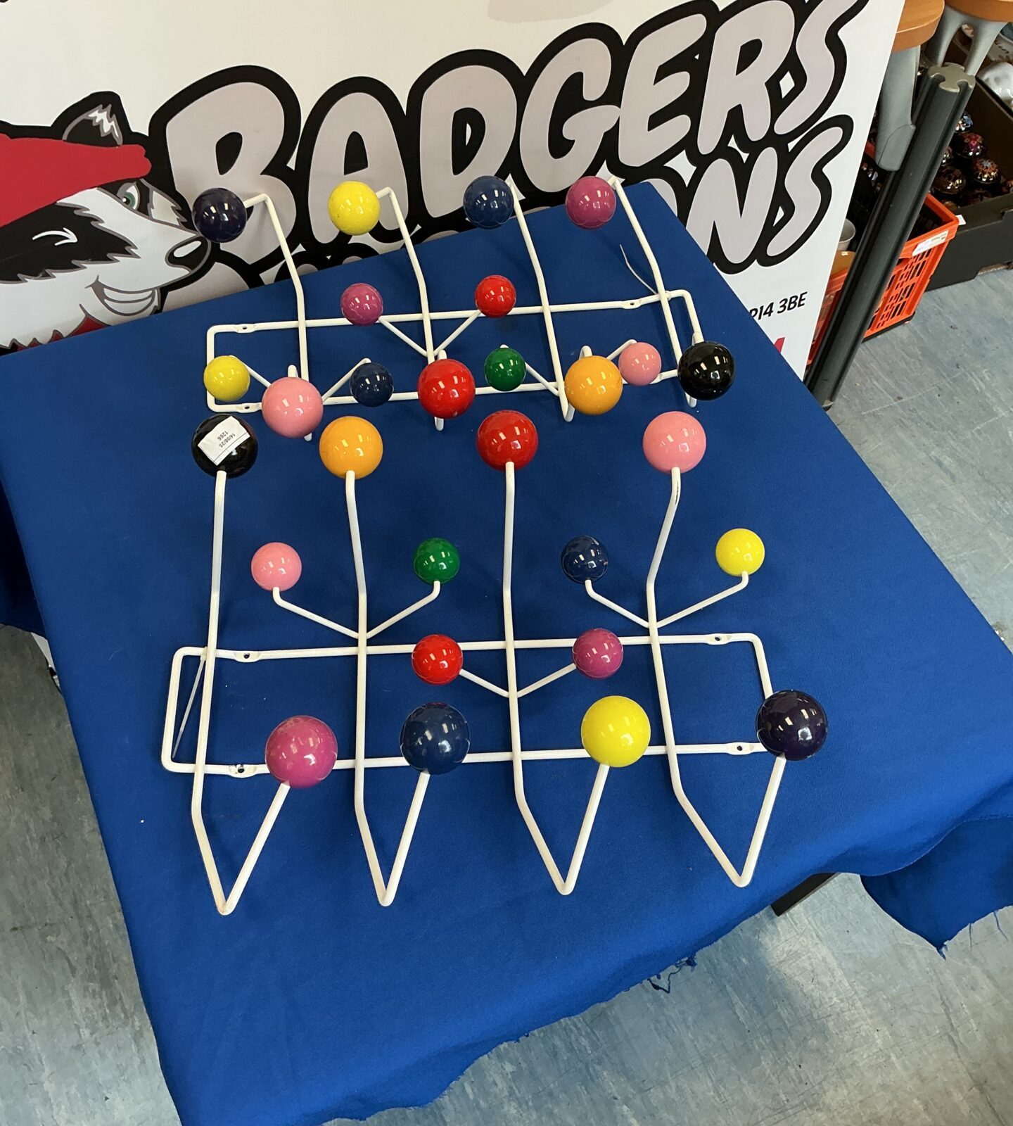 Two Vintage Atomic coat hangers