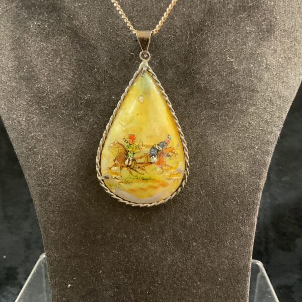 Antique Russian handpainted pendant necklace with Cossack scene.