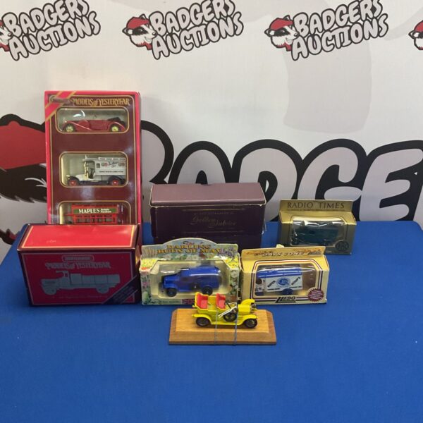 Boxed diecast model cars including Corgi and Matchbox vehicles.