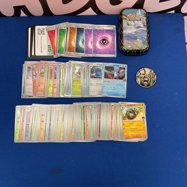 Mixed Pokemon card collection with holographic cards for collectors.