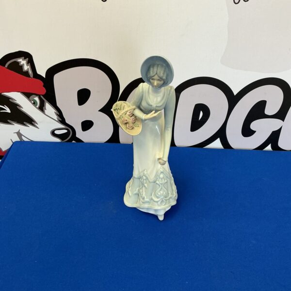 Spanish porcelain lady figurine