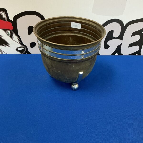 Vintage copper ice bucket with aged patina.