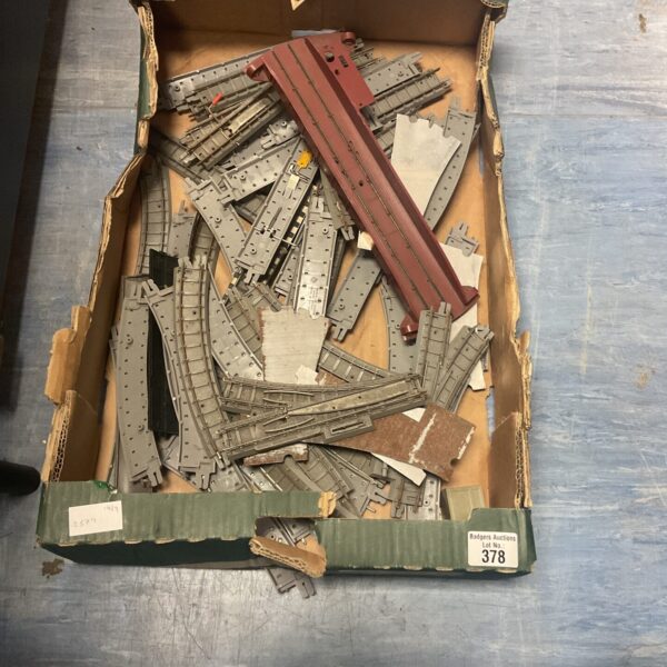 Vintage Triang 00 gauge railway track pieces in a box.