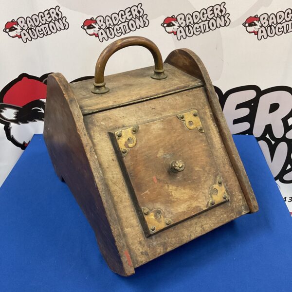 Antique Victorian coal box with brass details.