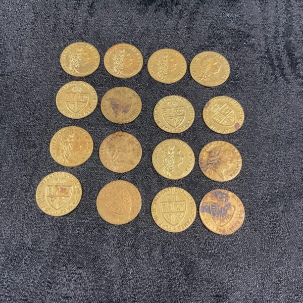 Lot of sixteen antique Georgian gaming tokens, brass counters.
