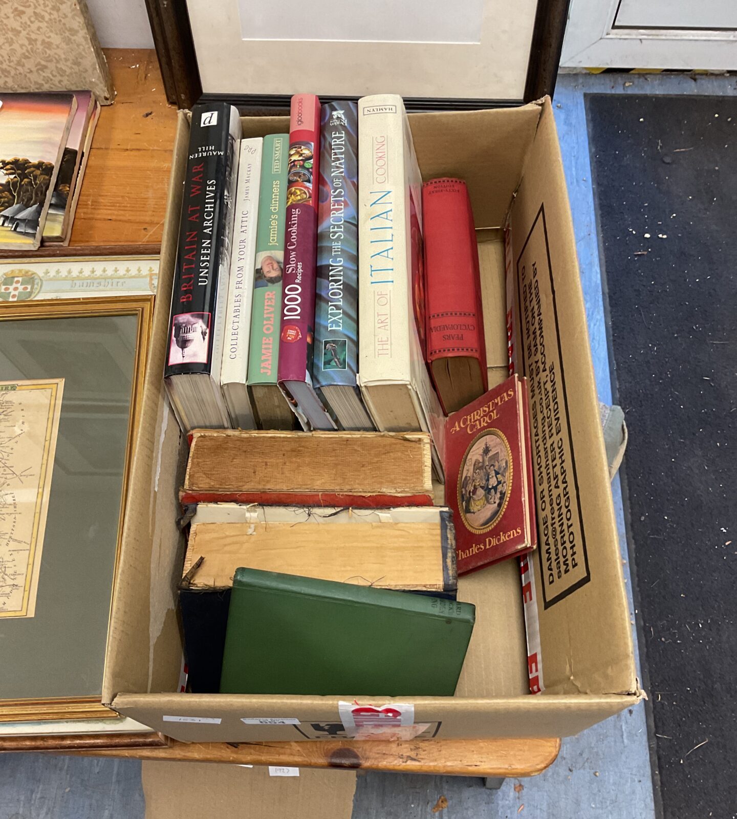 Box of books including cook books & charles dickins