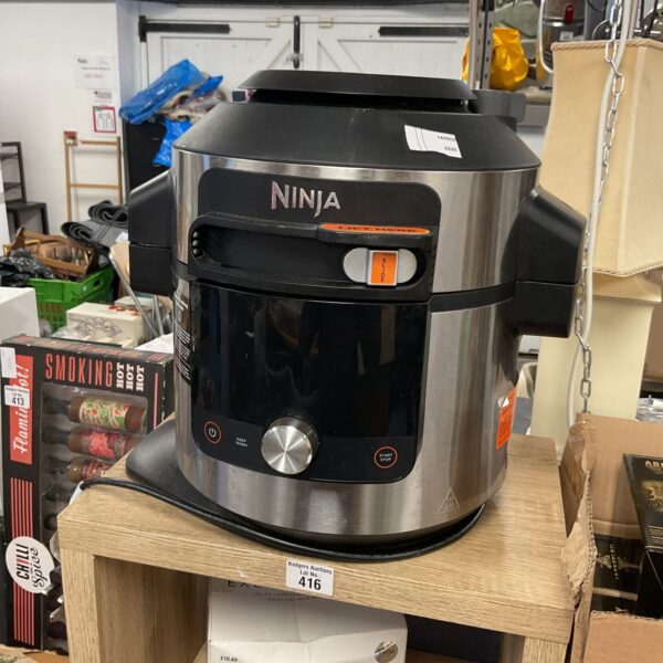 Silver Ninja Foodi multi cooker, model OP301, kitchen appliance.