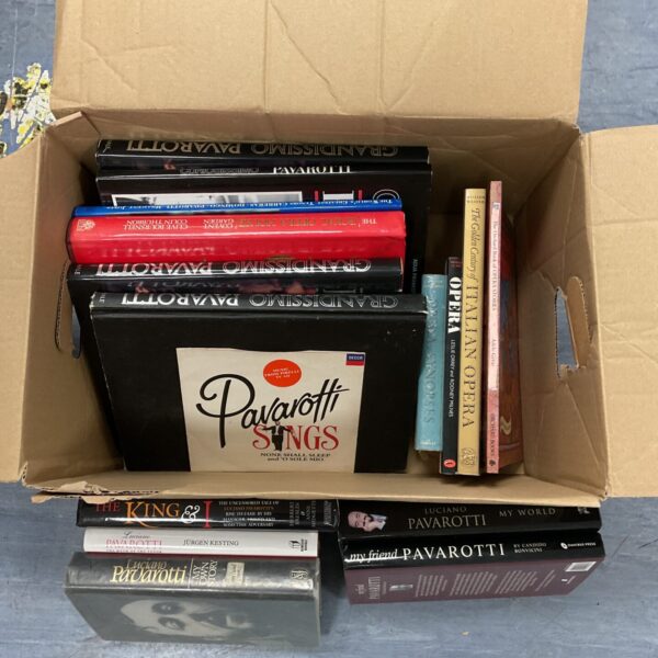 Box of luciano pavarotti books & 7” single vinyl record
