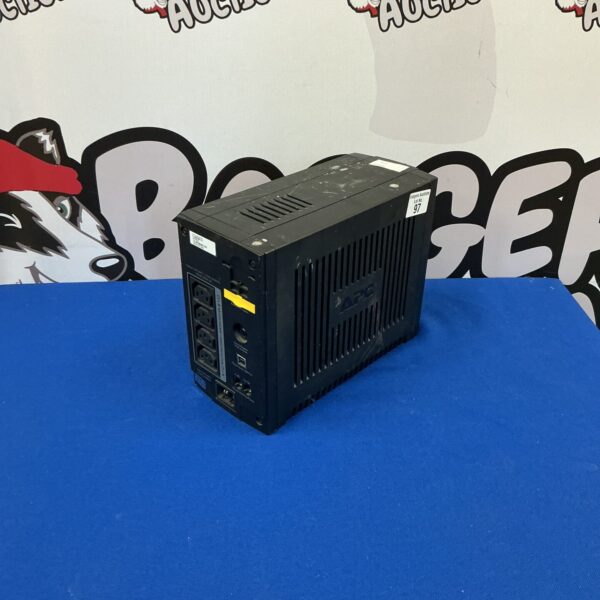 Front view of a used APC backup power supply unit.
