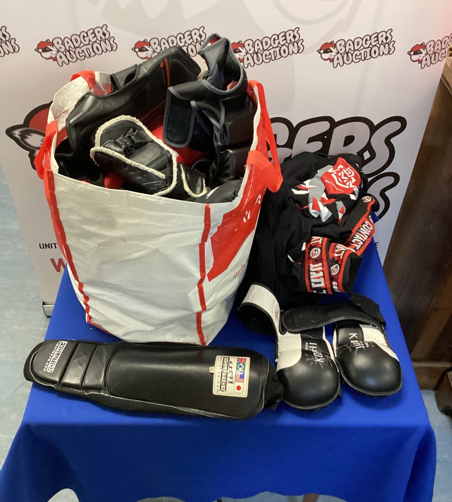 Bag of mixed martial arts sparring pads & clothing