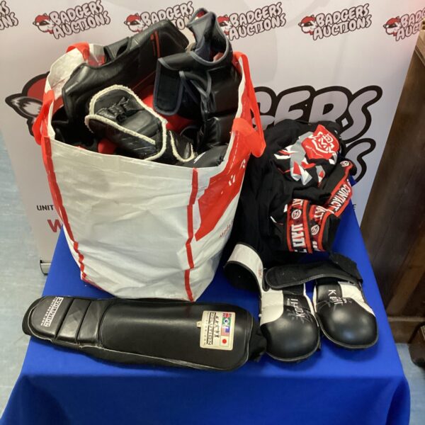 Bag of mixed martial arts sparring pads & clothing