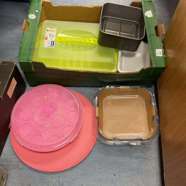 Mixed lot of plastic kitchen storage containers for food and kitchen organisation.