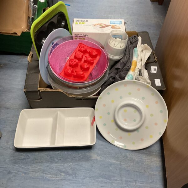 Mixed kitchenware lot with dishes, bowls, and a bread and dip plate.