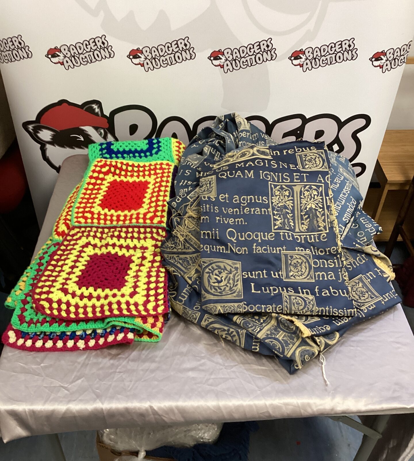 Bright patchwork blanket & gothic style curtains with fabric off cuts