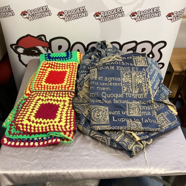 Bright patchwork blanket & gothic style curtains with fabric off cuts