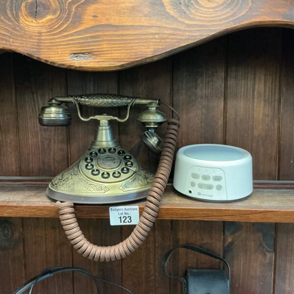 Vintage ProTelX antique telephone and Dreamegg sound machine.