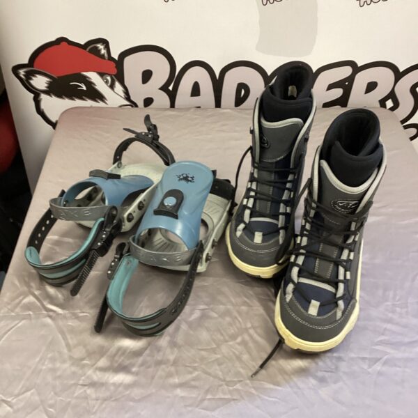 Pair of snow boots with drake snow board clips