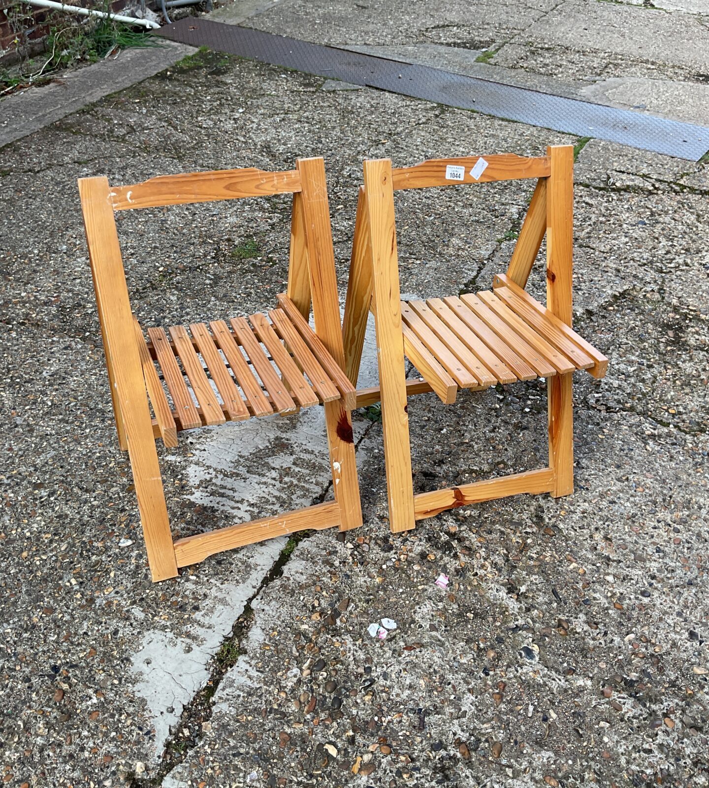 Two wooden folding childrens chairs