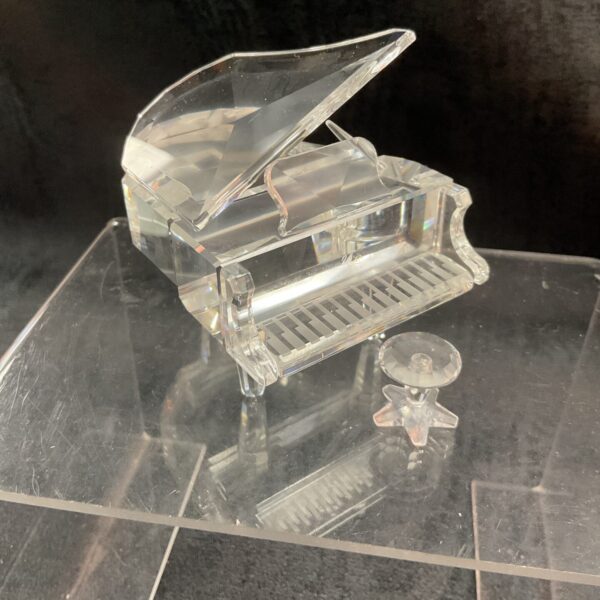 Stunning Swarovski crystal piano and stool figurine for collectors.
