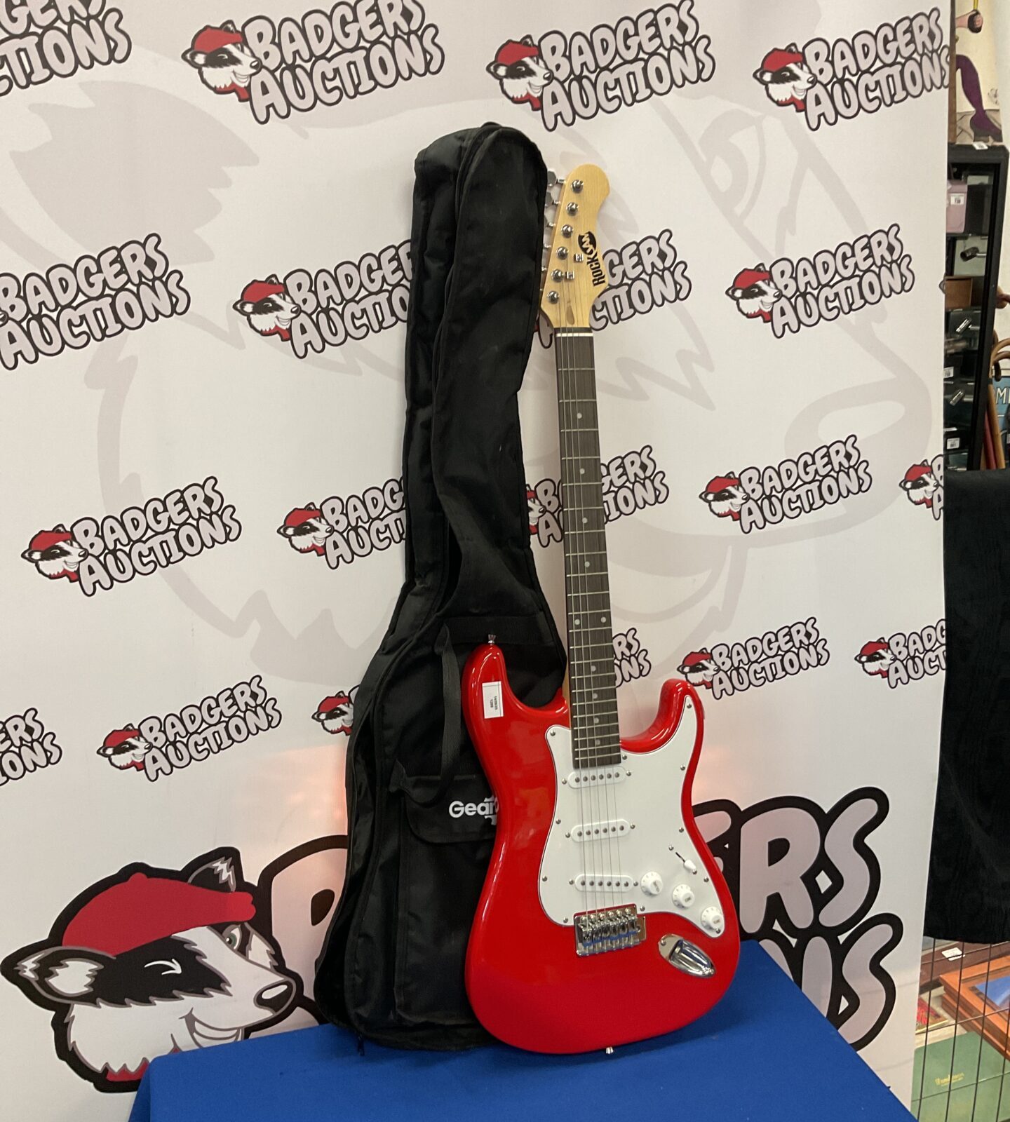 Red rock jam electric guitar in case