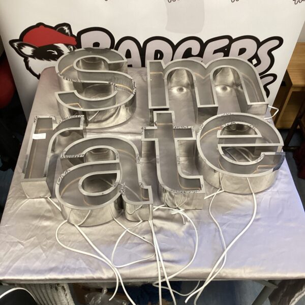 Selection of illuminated LED letter lights for signage.