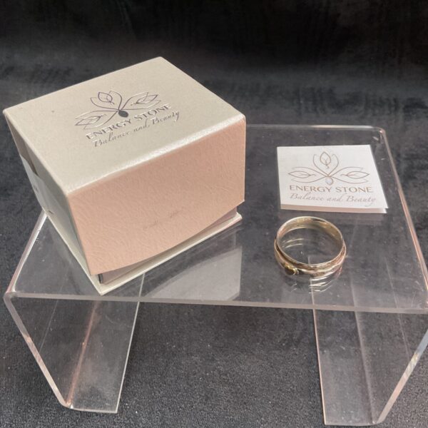 Silver spinner ring with heart design, size V.