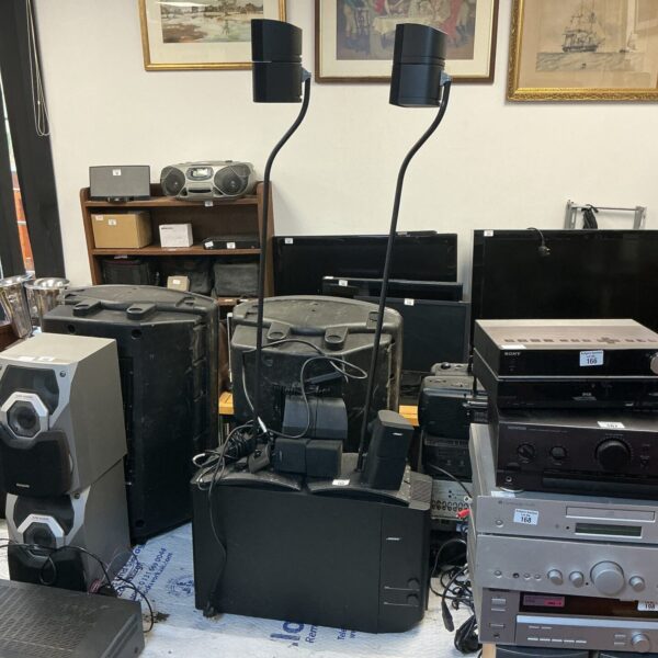 Used Bose Acoustimass 10 sound system with satellite speakers and module.