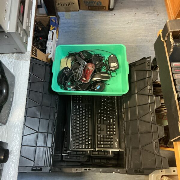 Crate of Logitech keyboards and lot of computer mice