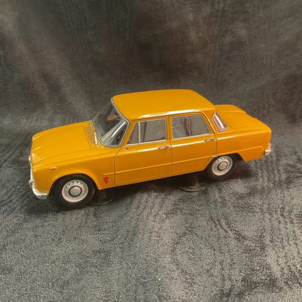 Yellow Minichamps Alfa Romeo Giulia 1:18 scale diecast model car.