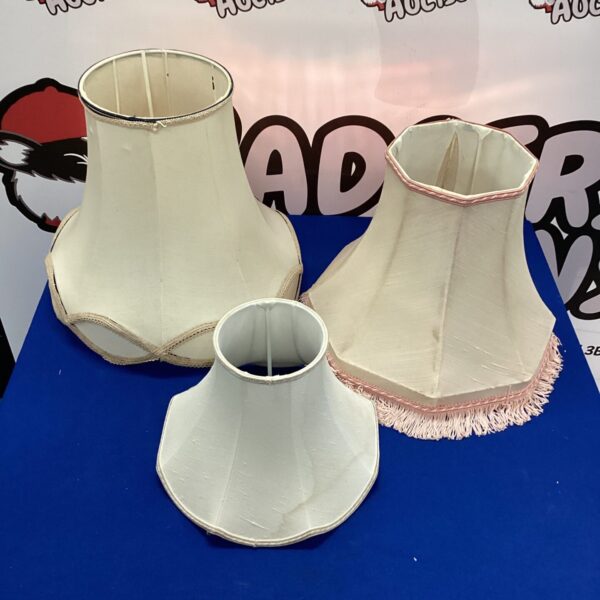 Vintage lamp shades lot with fringed edges.