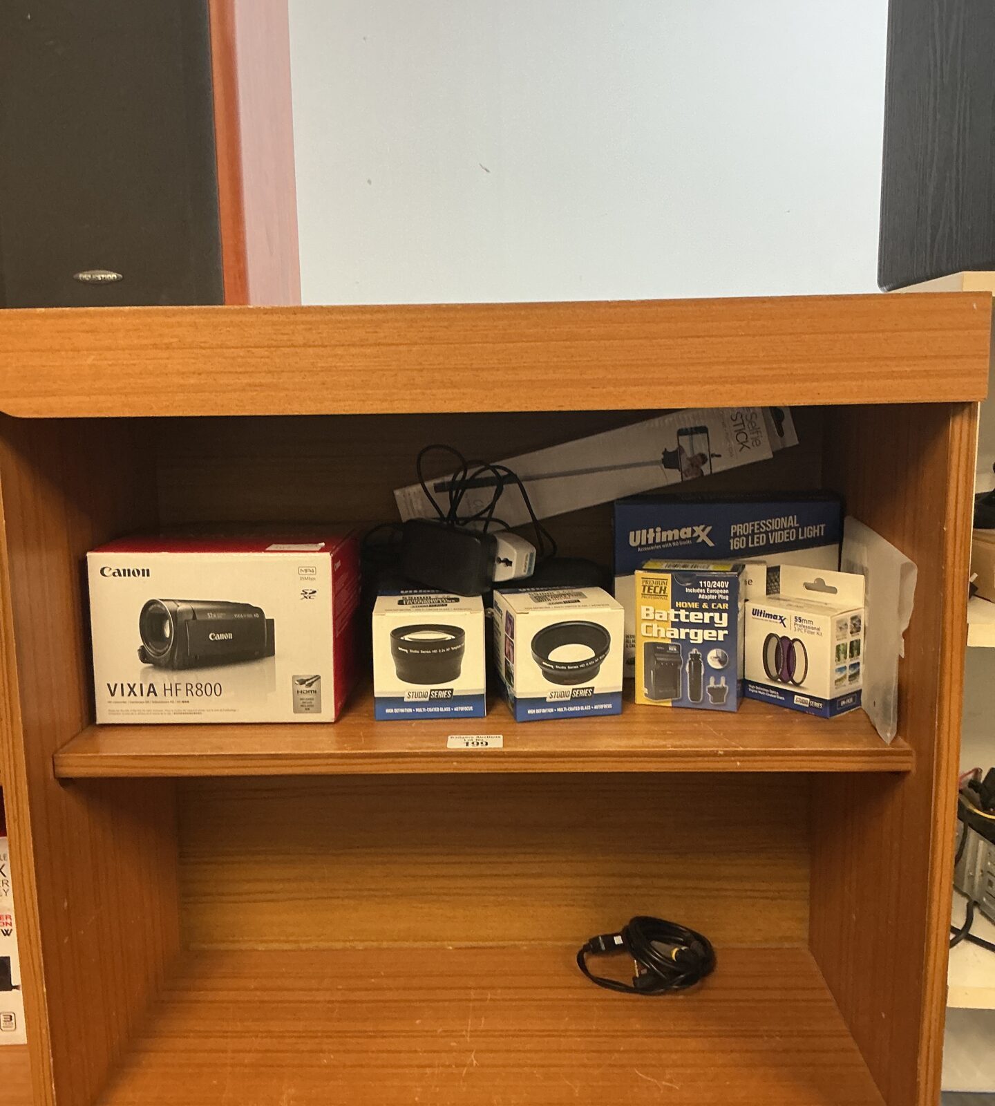 Canon Vixia HF R800 camcorder with selection of ultimax lenses and led light, selfie stick, and battery charger