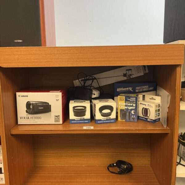 Canon Vixia HF R800 camcorder with selection of ultimax lenses and led light, selfie stick, and battery charger