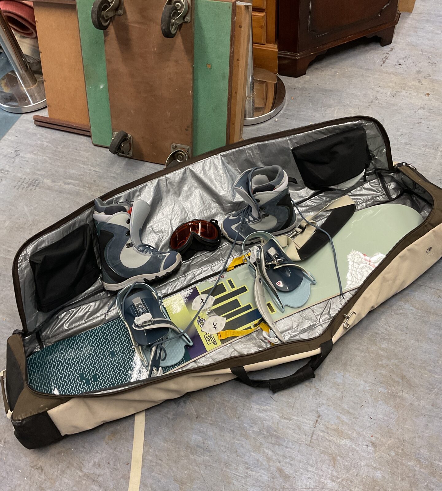 Burton snowboard in bag with boots & bindings
