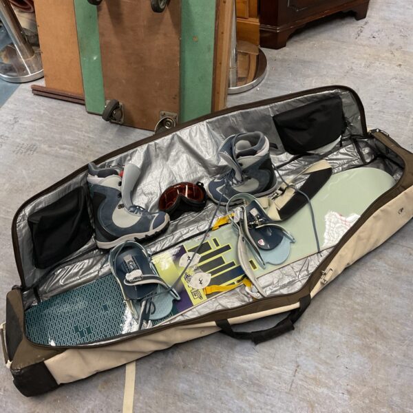Burton snowboard in bag with boots & bindings