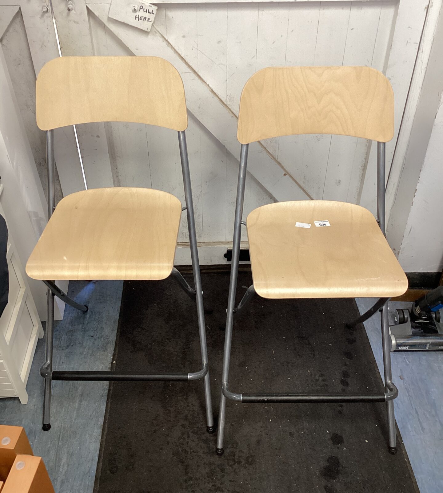 Two folding bar stools
