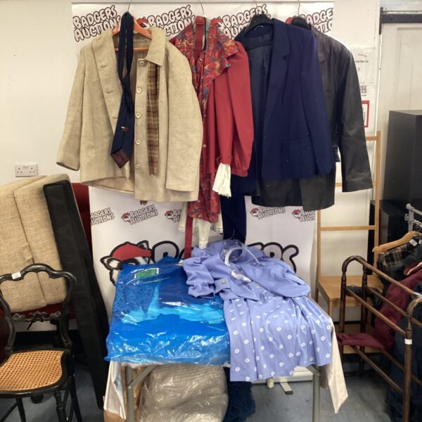 Mixed clothing lot with leather jacket and dresses.