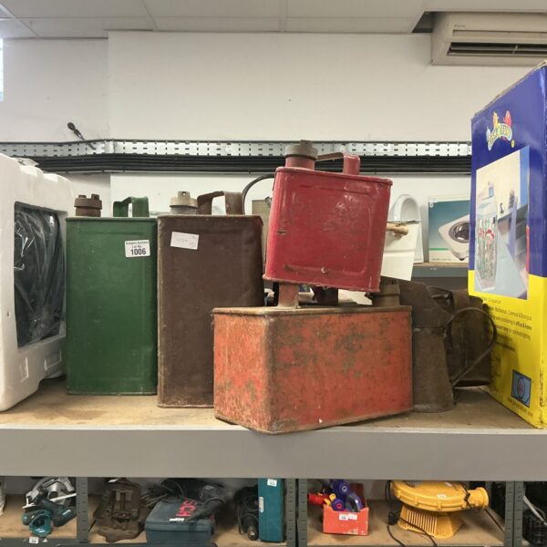Lot of three vintage metal gas cans for collectors.