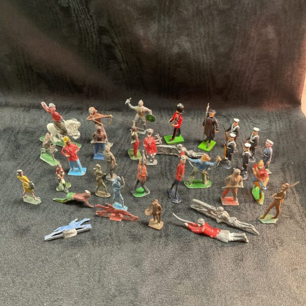 Vintage toy soldiers collection featuring lead and miniature military figures.