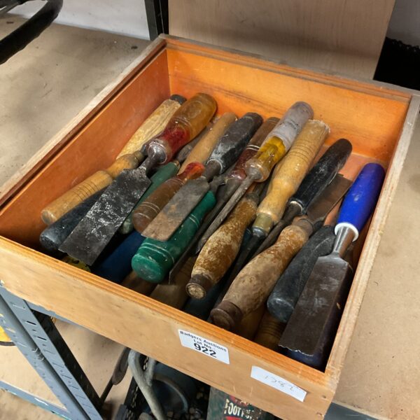Vintage carpenter's chisels in a tool lot, showing wear.