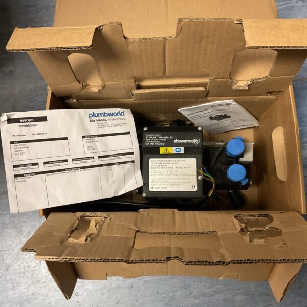 Stuart Turner Showermate pump in original packaging, side view.