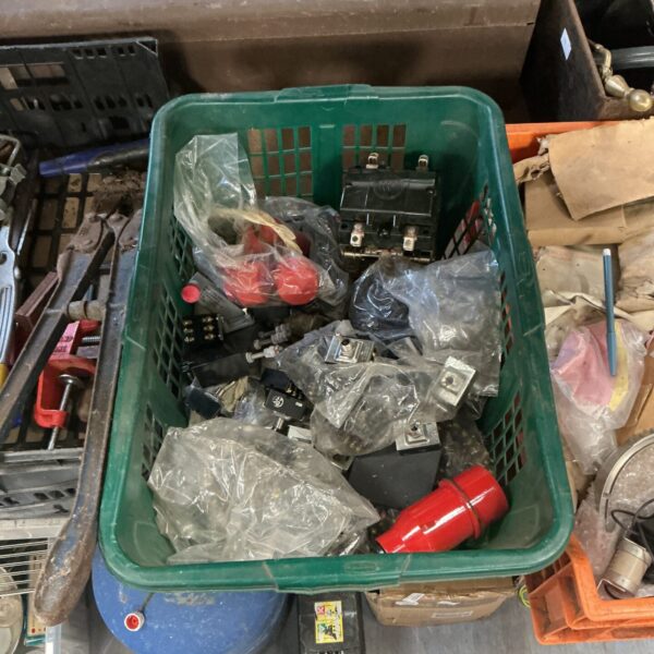 Ox of military spare parts, largely bags of toggle switches