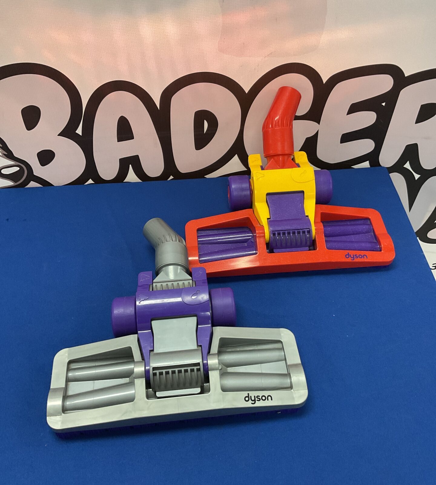 Two dyson vacuum cleaner heads