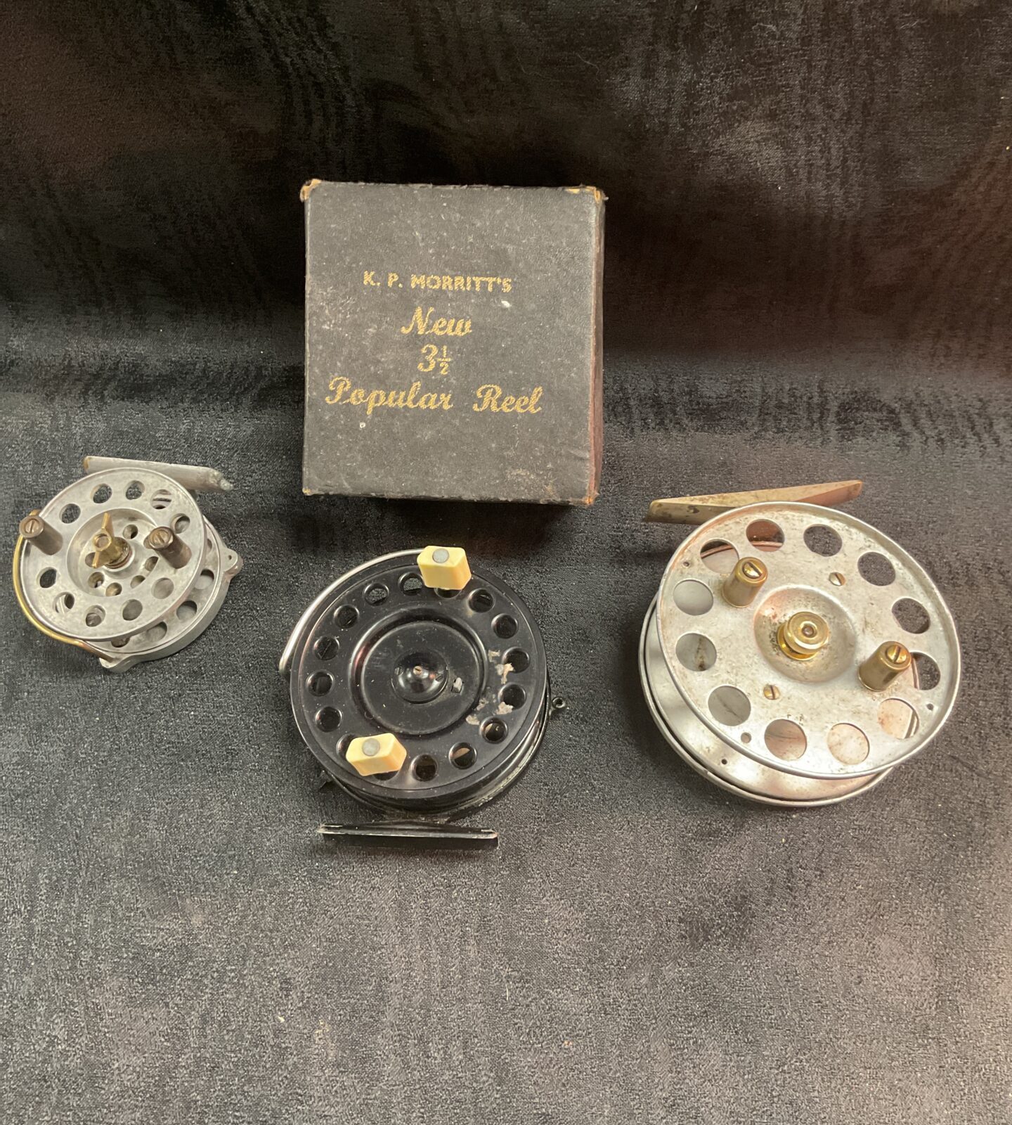 K P Morris’s New 3 1/2 “ Popular centre pin reel with box and two alloy reels