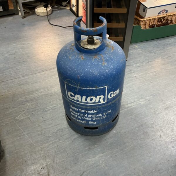 Full blue Calor Gas bottle for camping and outdoor use.
