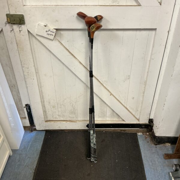 Vintage Wilson golf wood clubs in a classic set.