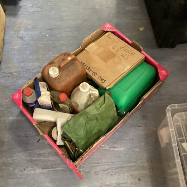 Tray of mixed chemicals with halfords fuel can
