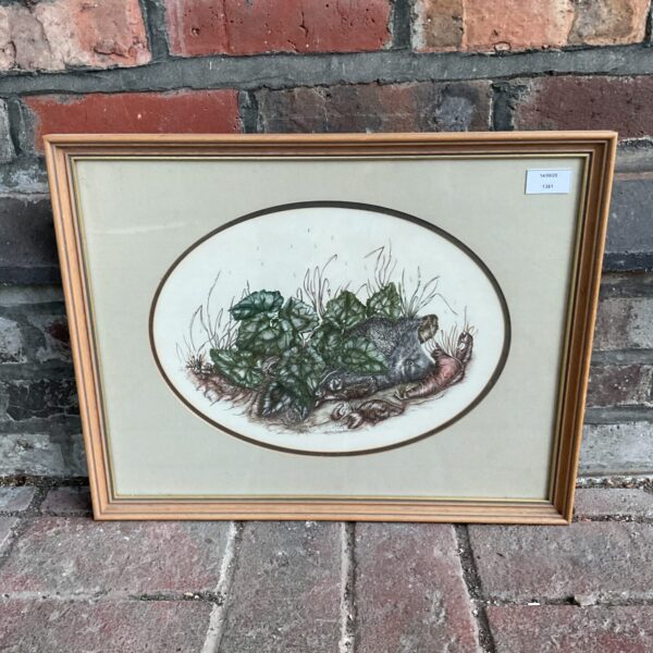 Framed Christine Woodley print of a hedgehog in woodland undergrowth.
